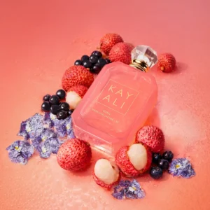 Eden Sparkling Lychee | 39 Kayali Eau de Parfum bottle with lychees and flowers