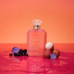 Eden Sparkling Lychee | 39 Kayali Eau de Parfum bottle with lychees