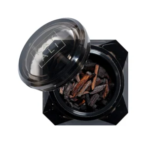 Oudgasm Tobacco Oud | 04 Bakhoor jar open showing the perfumed oud wood chips inside