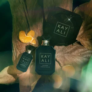 Oudgasm Tobacco Oud | 04 bottles among dried leaves and flowers