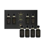 Oudgasm Miniature Set gift box with four miniature bottles in front of it