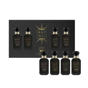 Oudgasm Miniature Set gift box with four miniature bottles in front of it