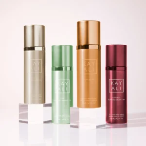 Four Kayali body spray cans in a row including the bronze Vanilla | 28 Body Spray can