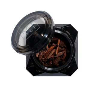 Open jar of Oudgasm Smoky Oud | 07 Bakhoor showing the perfumed oud wood chips
