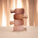Freedom Musk Obsessions Miniature Set four miniature bottles stacked in sunlight