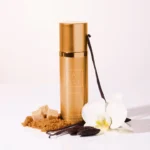 Vanilla | 28 Body Spray bronze can with brown sugar, vanilla pods and a white orchid