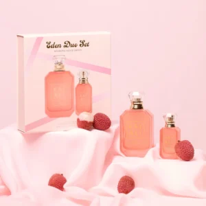 Eden Duo Set gift box with full and travel bottles and fresh lychees on pink silk