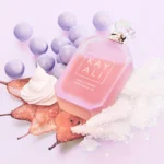 Vanilla Candy Rock Sugar | 42 bottle lying among purple candy spheres, rock sugar crystals and dried orange slices